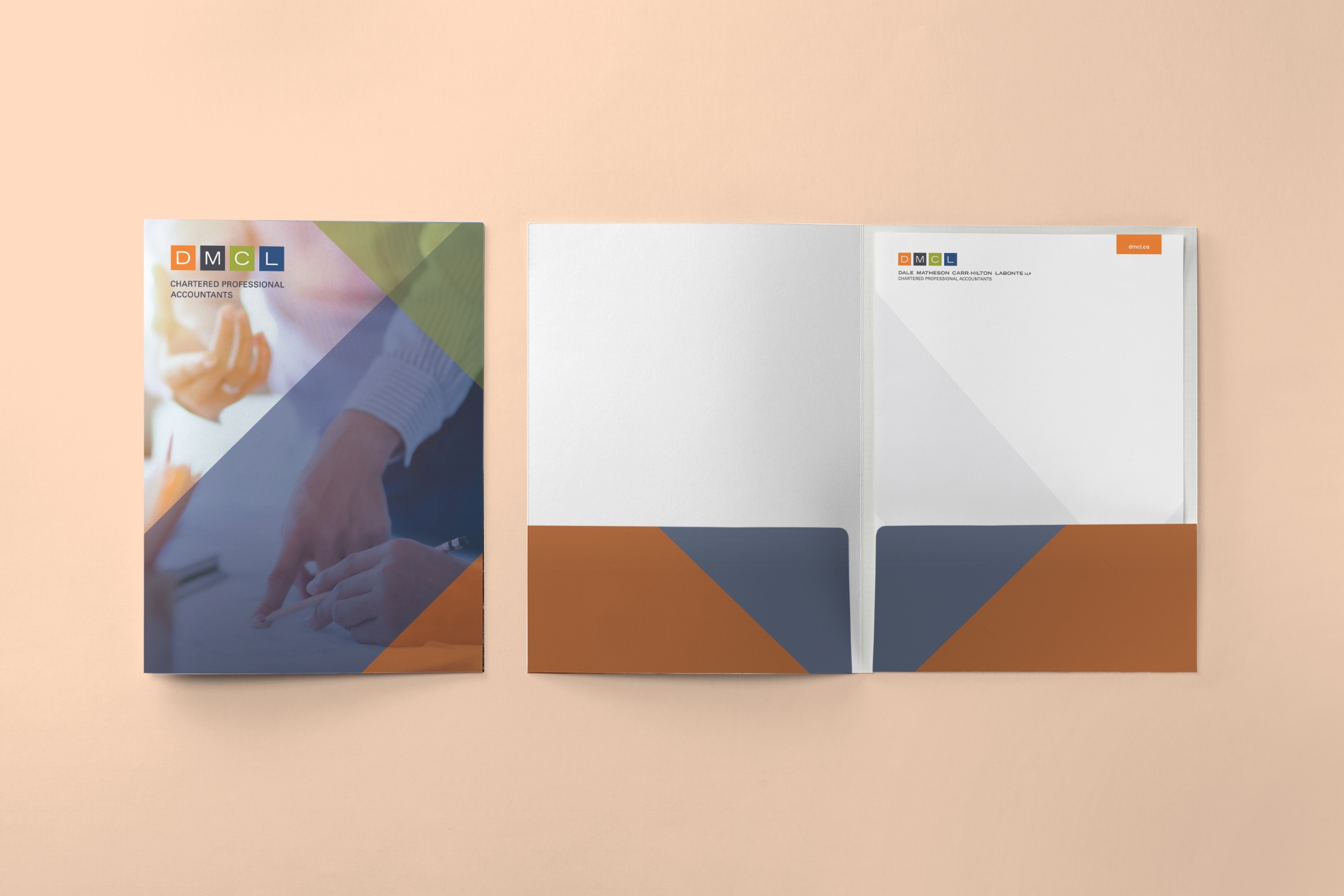 A closed folder with DMCL branding on the left and an open folder with branded stationary on the right.