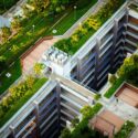 Aerial view of a modern building with green rooftop gardens, showcasing sustainability marketing in urban architecture